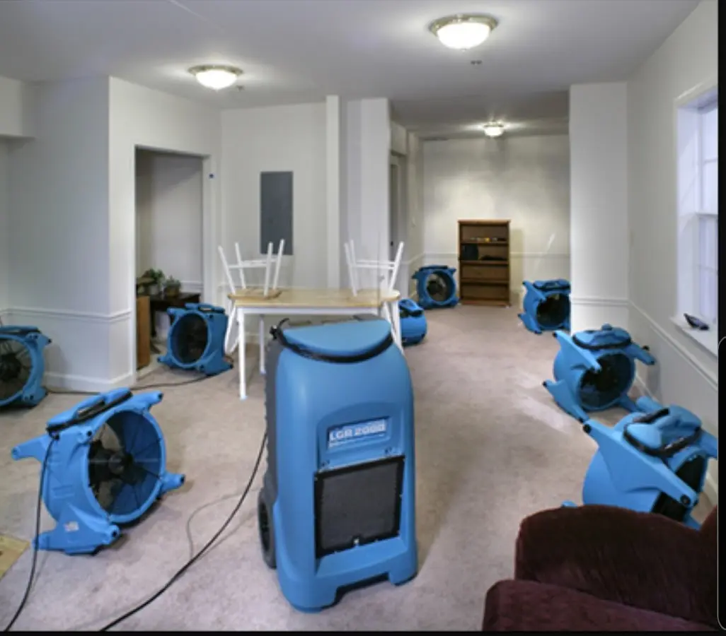 Air movers and dehumidifier setup for Water Extraction & Removal in Calumet